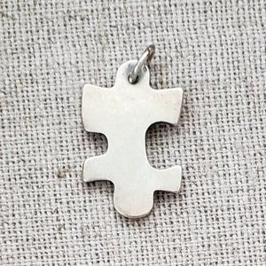 SOLDJames Avery Sterling Silver Puzzle Piece Charm